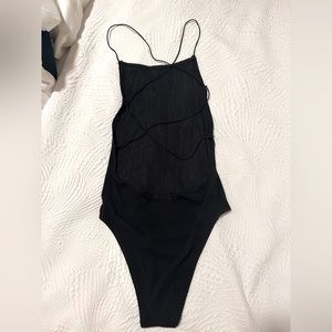 Black backless body suit